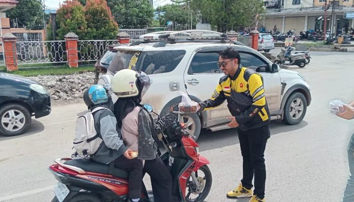 Polres Paser dan Maxim Gelar Sosialisasi Keselamatan dan Bakti Sosial